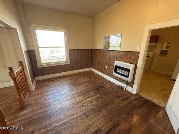 a view of a livingroom with wooden floor
