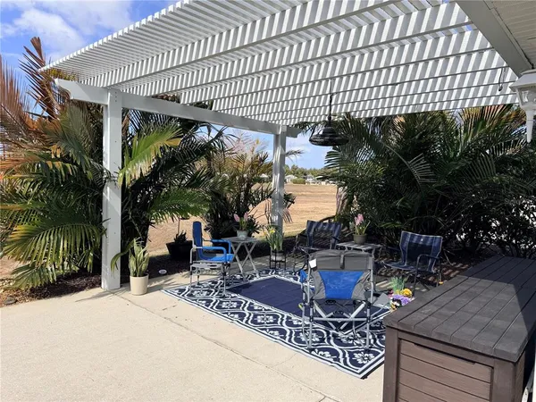 a outdoor view of a sitting area with furniture