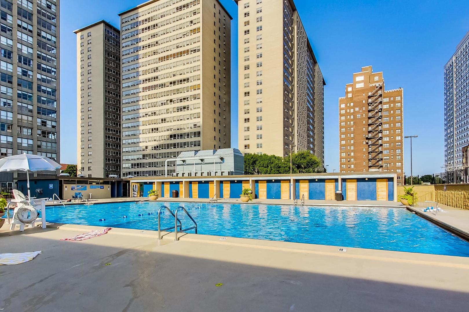 655 West Irving Park Road, Unit 2302 Chicago, IL 60613 - Photo 25 of 41 a view of swimming pool with outdoor seating