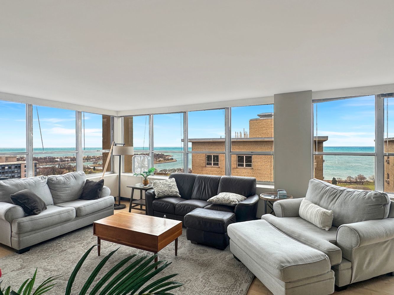 655 West Irving Park Road, Unit 2302 Chicago, IL 60613 - Photo 5 of 41 a living room with furniture and a large window