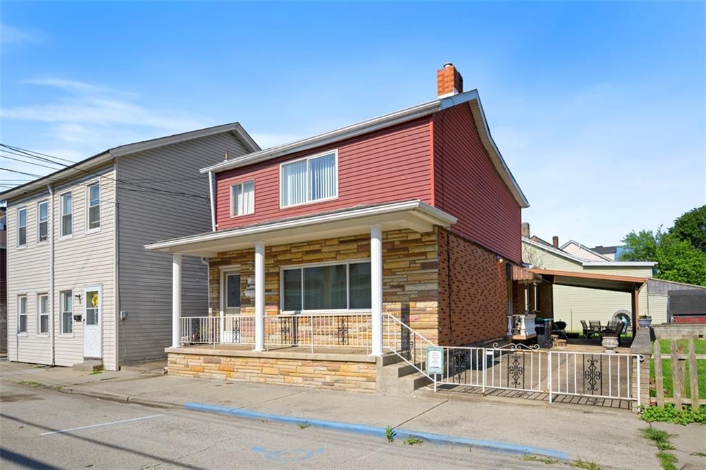 a view of a house with a patio