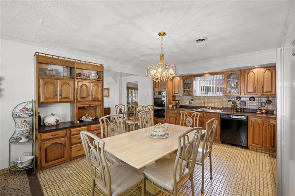 213 18th Street Pittsburgh, PA 15215 - Photo 12 of 42 a view of a dining room with furniture