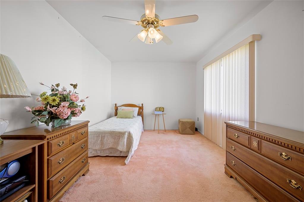 213 18th Street Pittsburgh, PA 15215 - Photo 23 of 42 a bedroom with furniture and a window