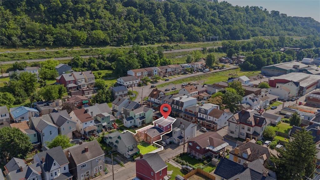 213 18th Street Pittsburgh, PA 15215 - Photo 40 of 42 an aerial view of a house with a garden