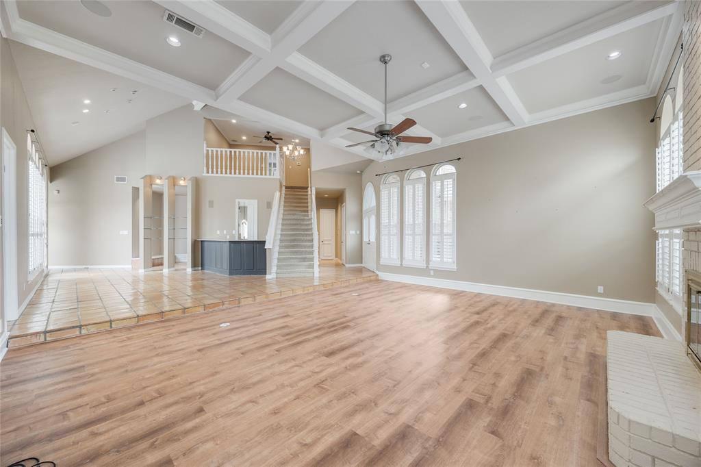 1201 Findlay Drive Arlington, TX 76012 - Photo 7 of 35 an empty room with wooden floor and windows