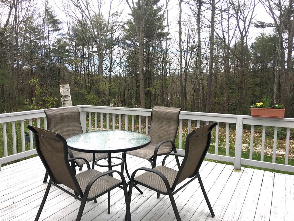 83 Pine Hill Road York, ME 03902 - Photo 9 of 34 A large deck overlooking the backyard.