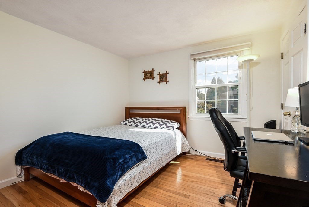 101 Standish Road Needham, MA 02492 - Photo 20 of 38 a bedroom with a bed window and a desk