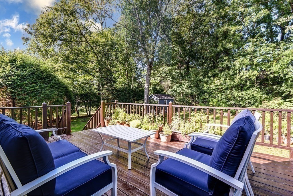 101 Standish Road Needham, MA 02492 - Photo 27 of 38 a view of a patio with couches chairs and a table