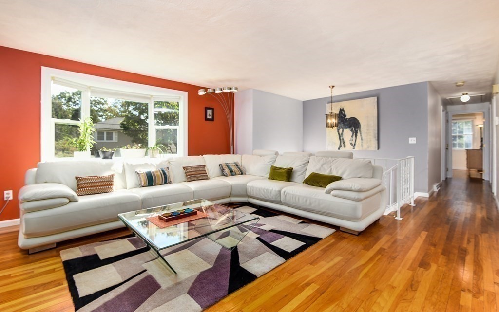 101 Standish Road Needham, MA 02492 - Photo 4 of 38 a living room with furniture and a large window
