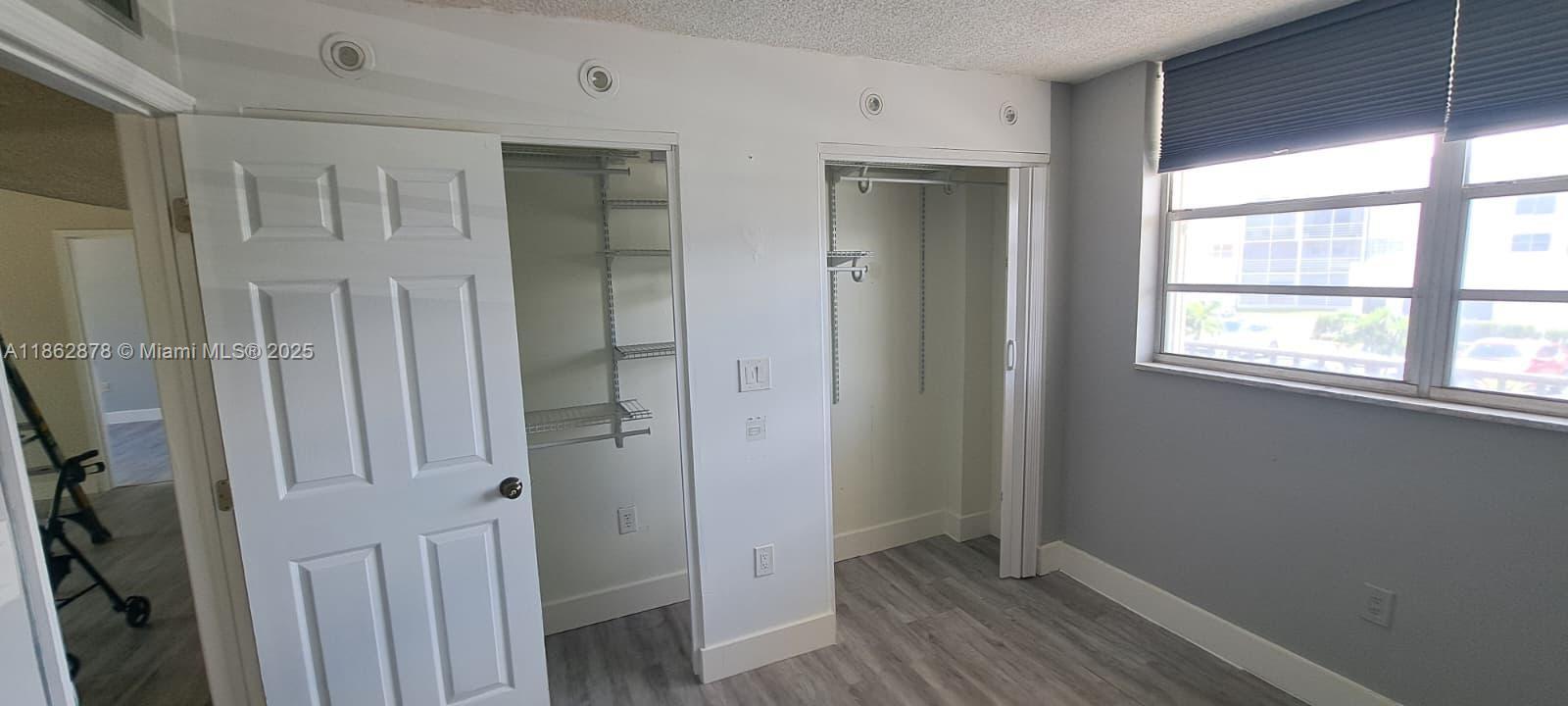 14180 Southwest 84th Street, Unit 203G Miami, FL 33183 - Photo 7 of 17 wooden floor in a gallery