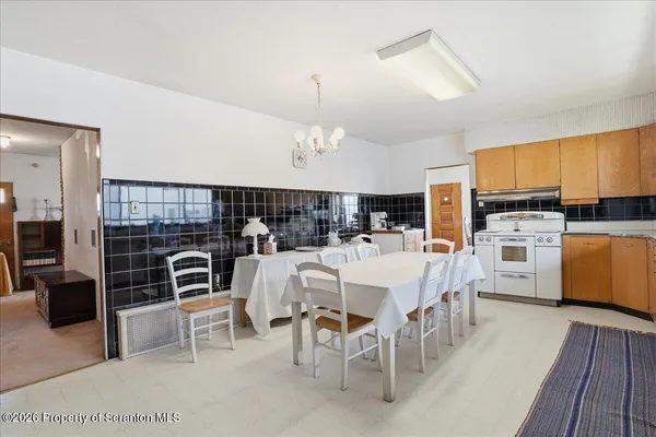 a view of a dining room kitchen and dining room