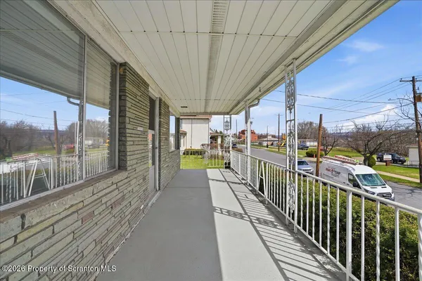 a view of a house with a back yard