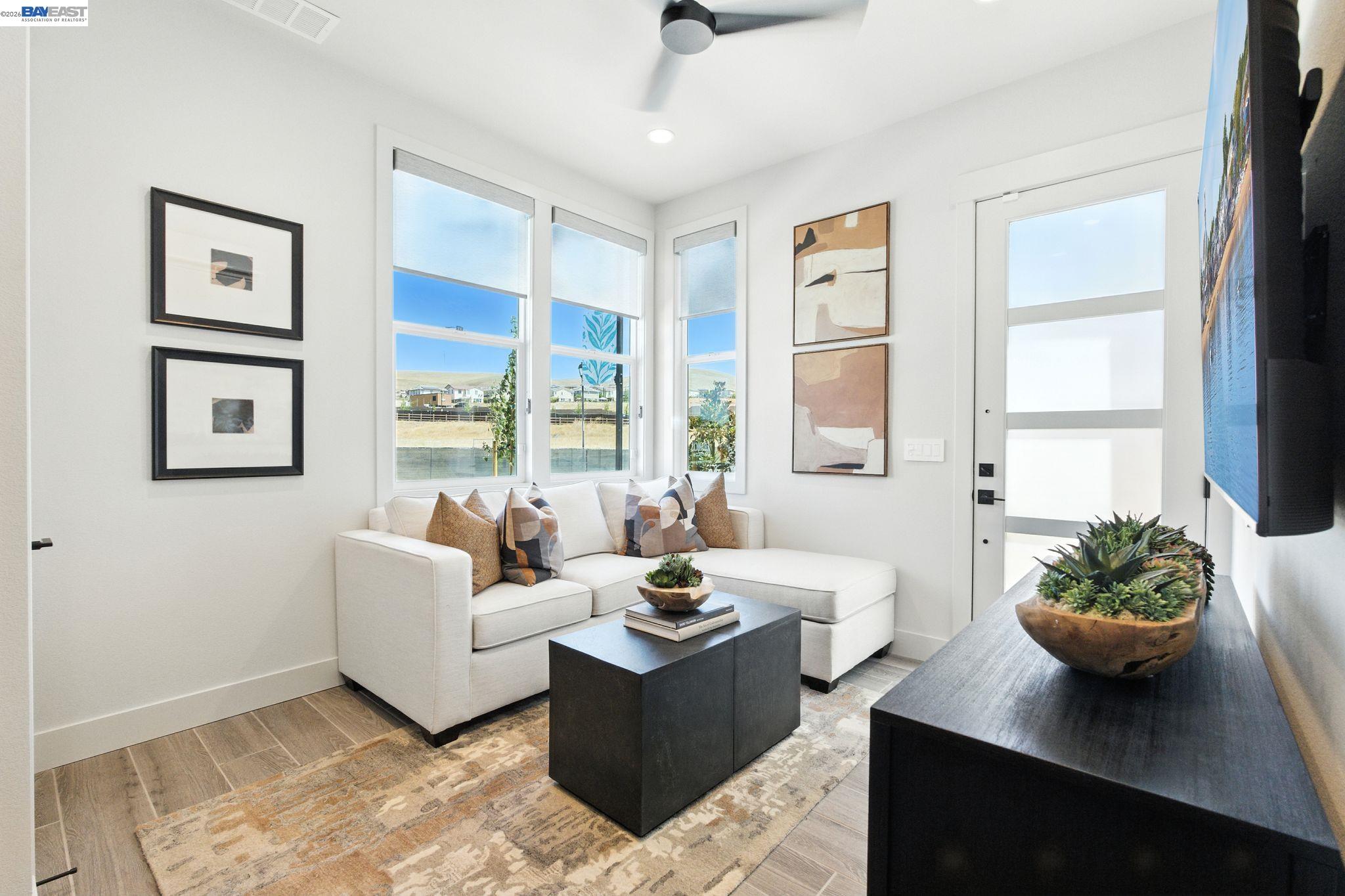 4237 Langley Road Dublin, CA 94568 - Photo 12 of 40 a living room with furniture potted plant and window