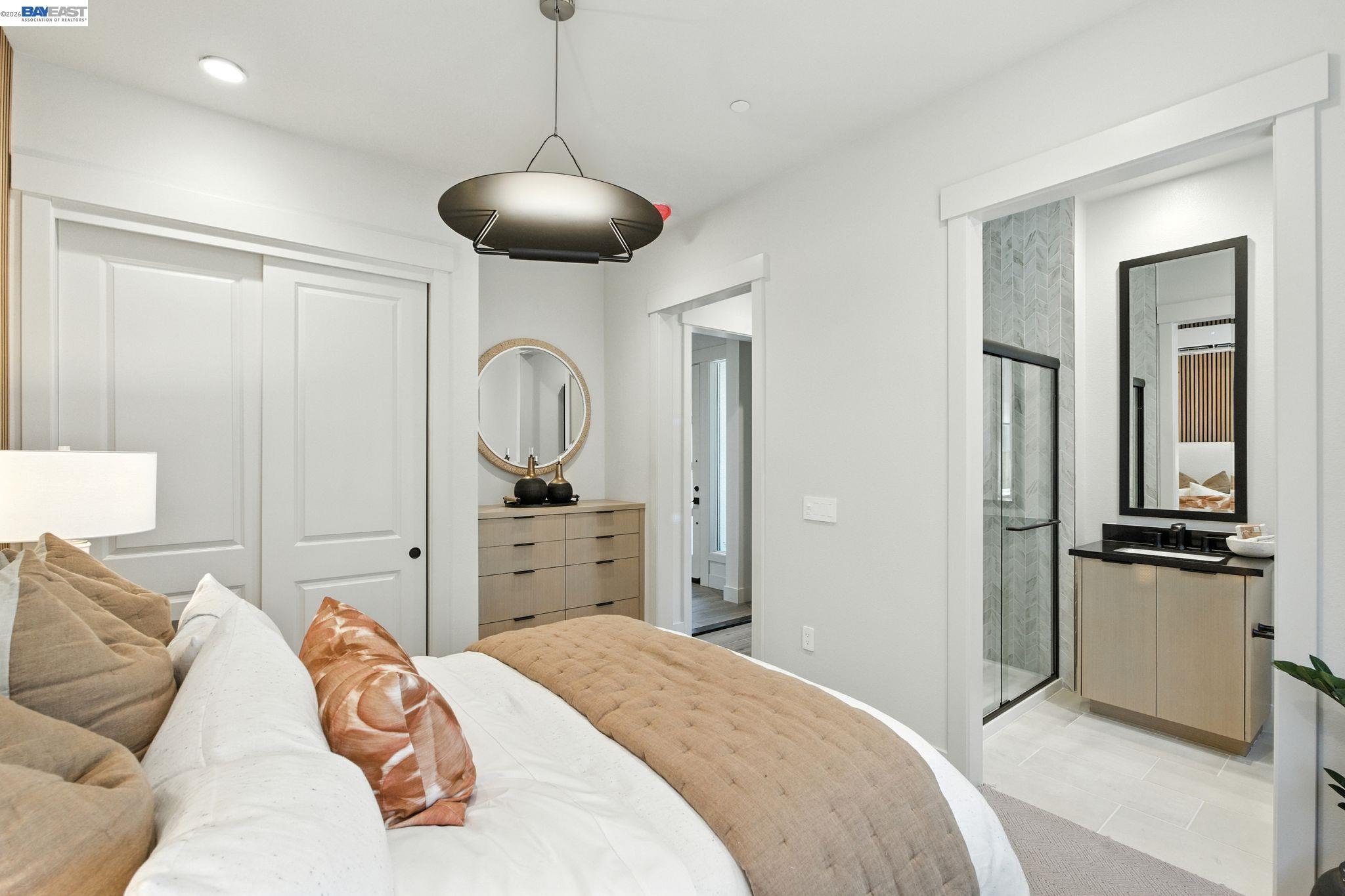 4237 Langley Road Dublin, CA 94568 - Photo 16 of 40 a bedroom with a bed and furniture