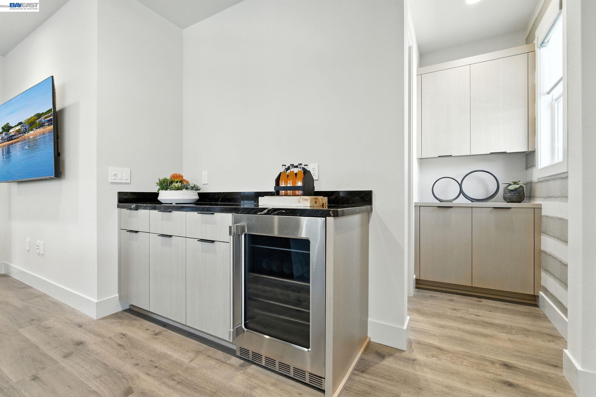4237 Langley Road Dublin, CA 94568 - Photo 21 of 40 a kitchen with stainless steel appliances granite countertop a stove and a refrigerator