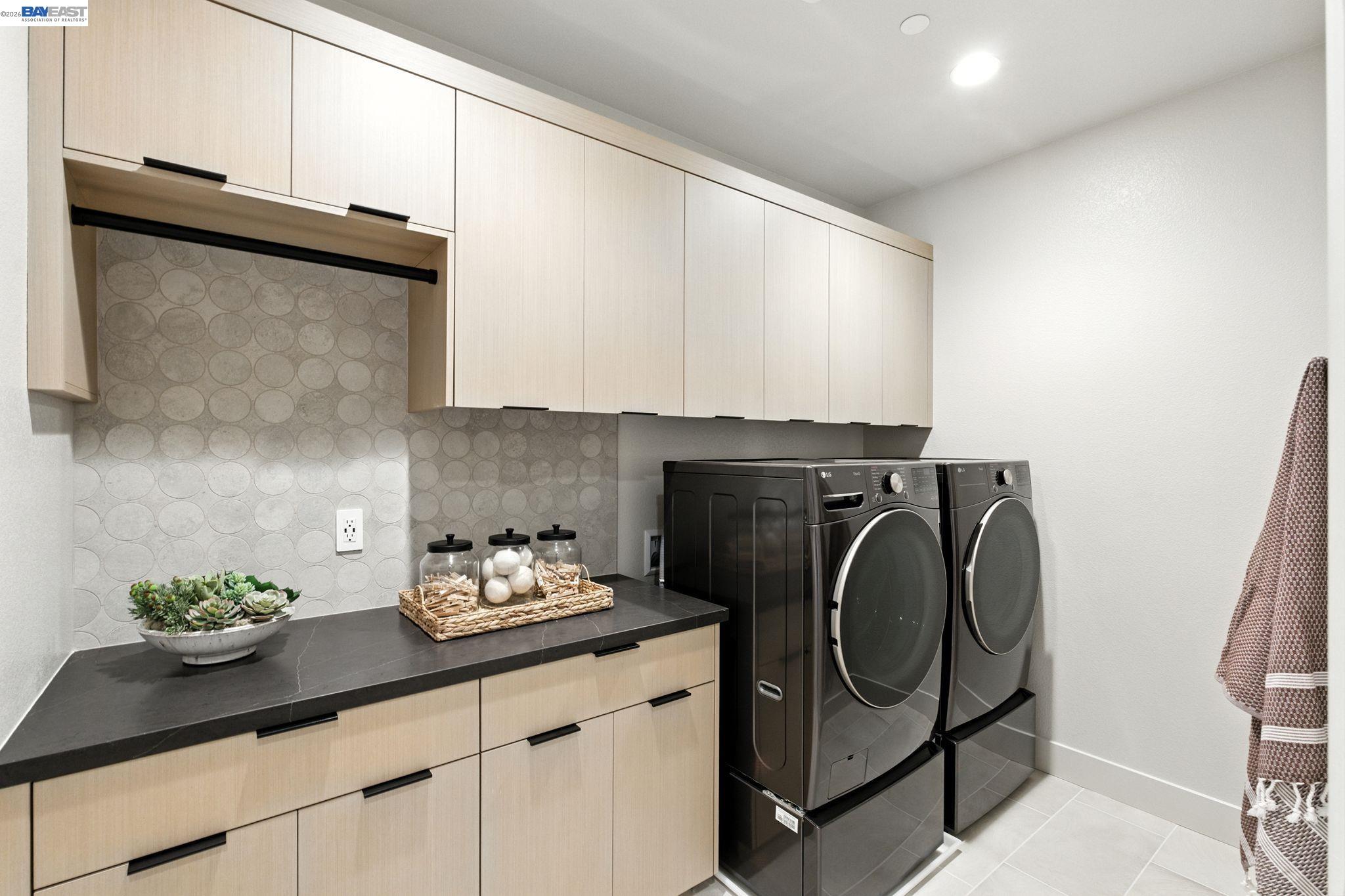 4237 Langley Road Dublin, CA 94568 - Photo 23 of 40 a kitchen with a sink and cabinets