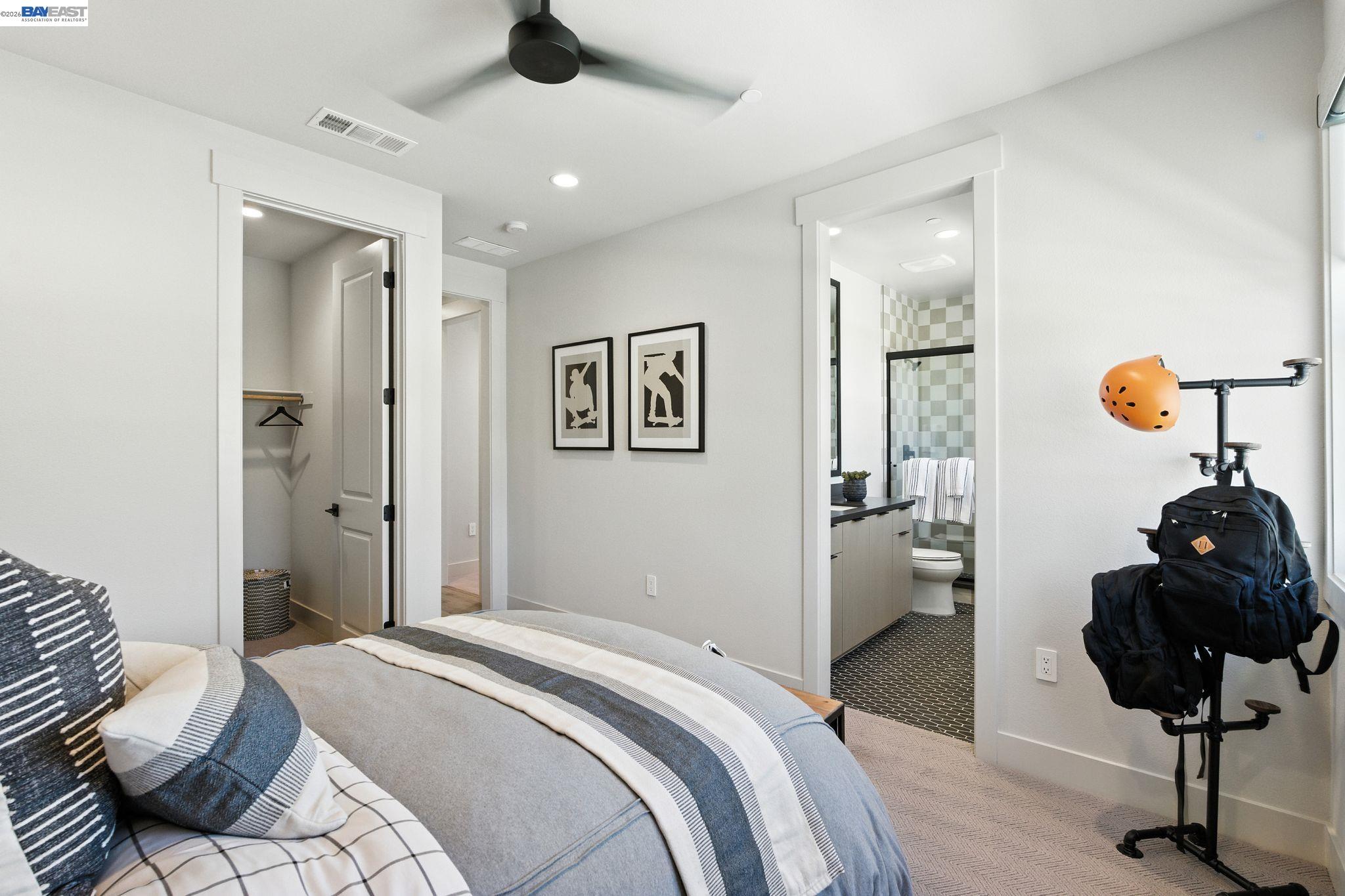 4237 Langley Road Dublin, CA 94568 - Photo 25 of 40 a bedroom with a bed and wooden floor