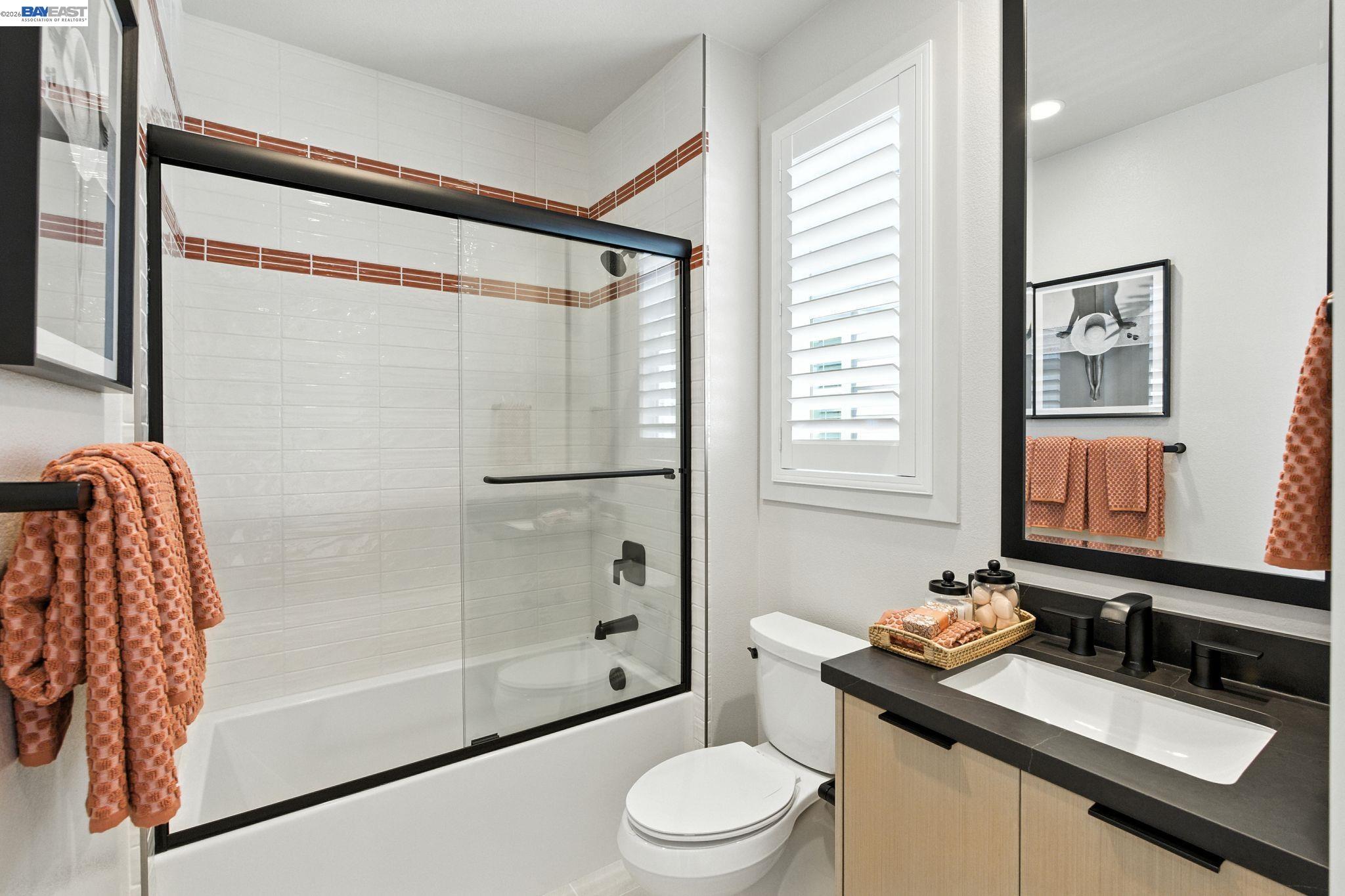 4237 Langley Road Dublin, CA 94568 - Photo 29 of 40 a bathroom with a sink toilet and shower