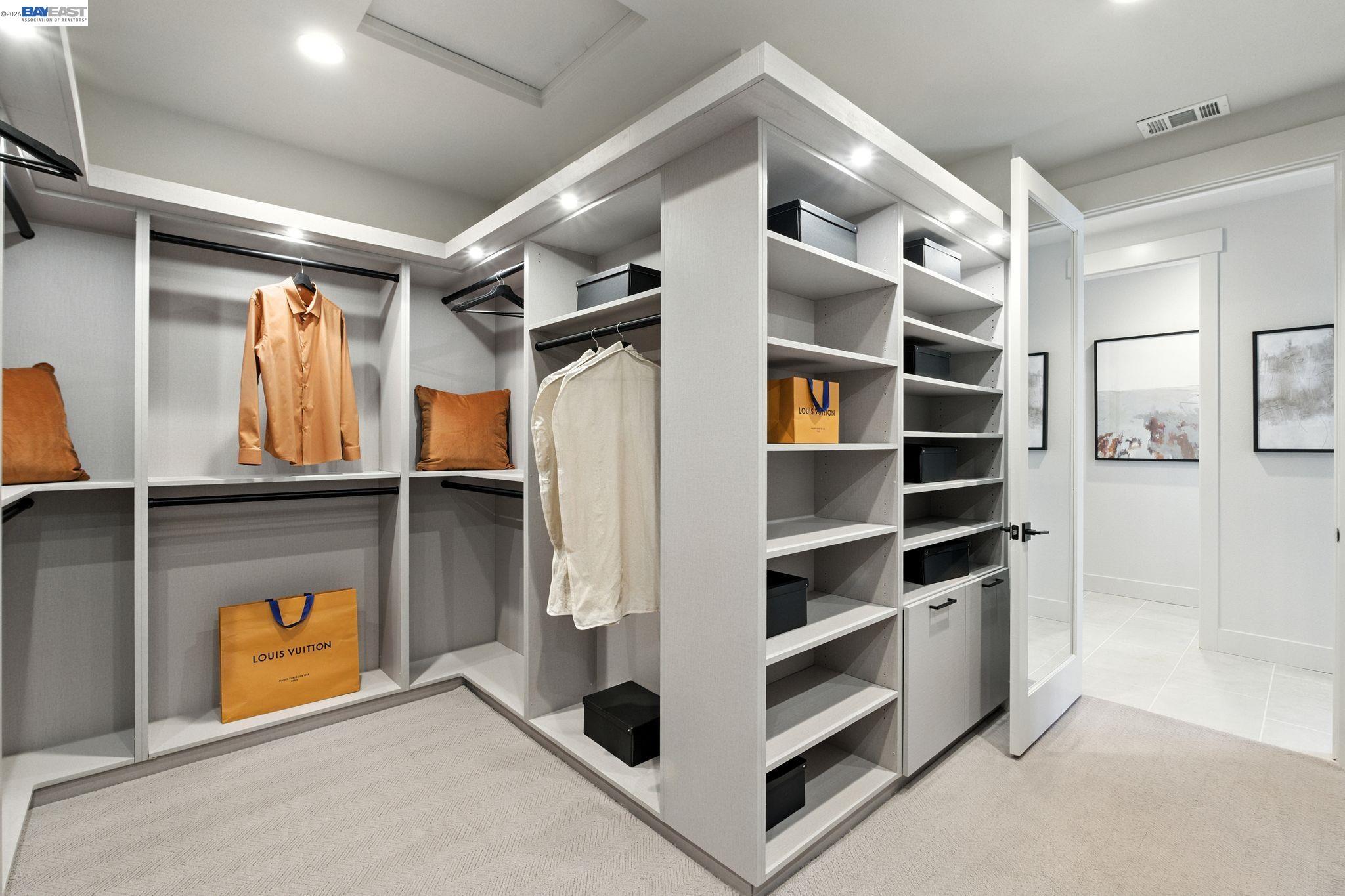 4237 Langley Road Dublin, CA 94568 - Photo 36 of 40 a view of walk in closet with empty racks