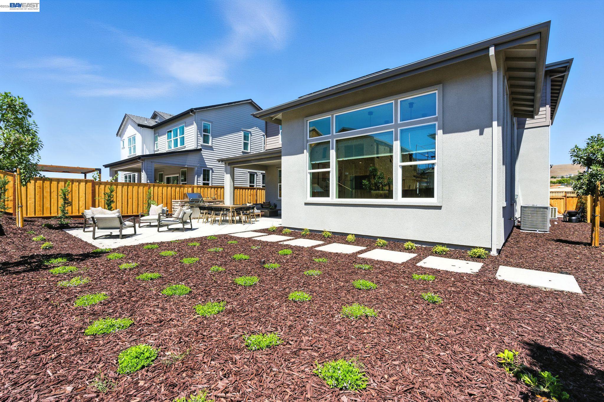 4237 Langley Road Dublin, CA 94568 - Photo 40 of 40 a front view of a house with a yard