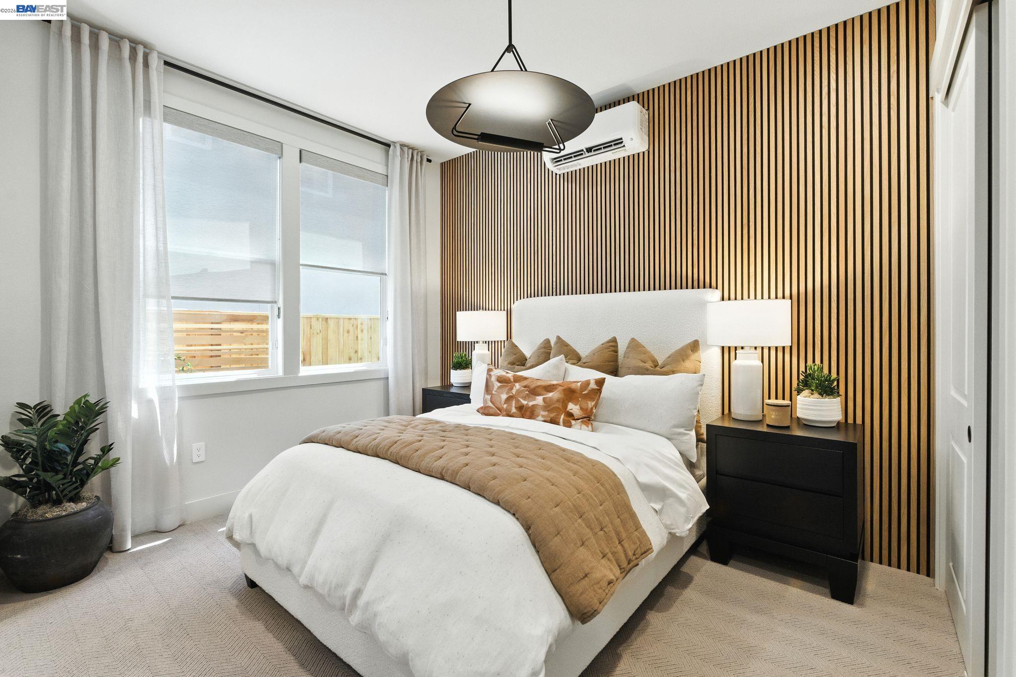 4237 Langley Road Dublin, CA 94568 - Photo 5 of 40 a bedroom with a bed and a chandelier
