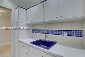 a bathroom with a toilet and a bathtub