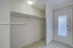 a view of a hallway with entryway