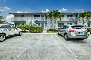 a car parked in front of a building