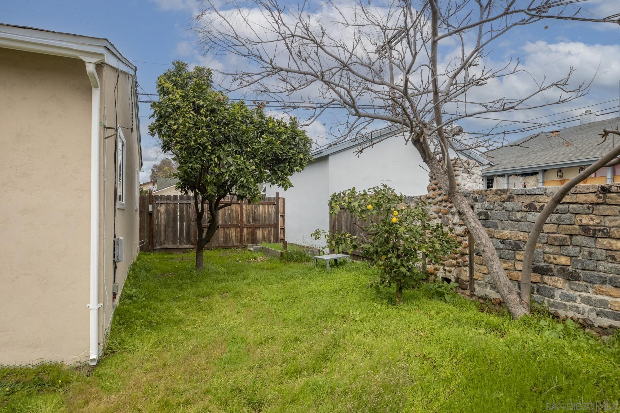 6979 Tower Street La Mesa, CA 91942 - Photo 25 of 30 a view of an outdoor space and a yard