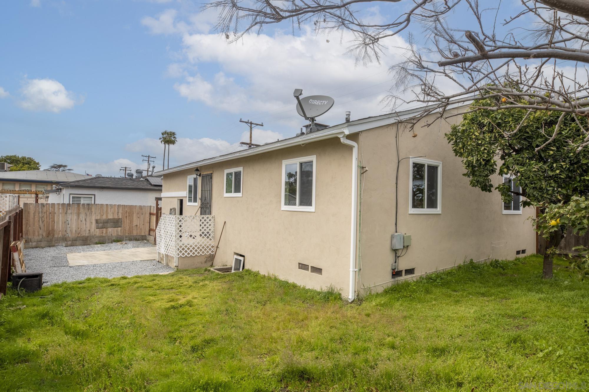 6979 Tower Street La Mesa, CA 91942 - Photo 26 of 30 a front view of a house with garden