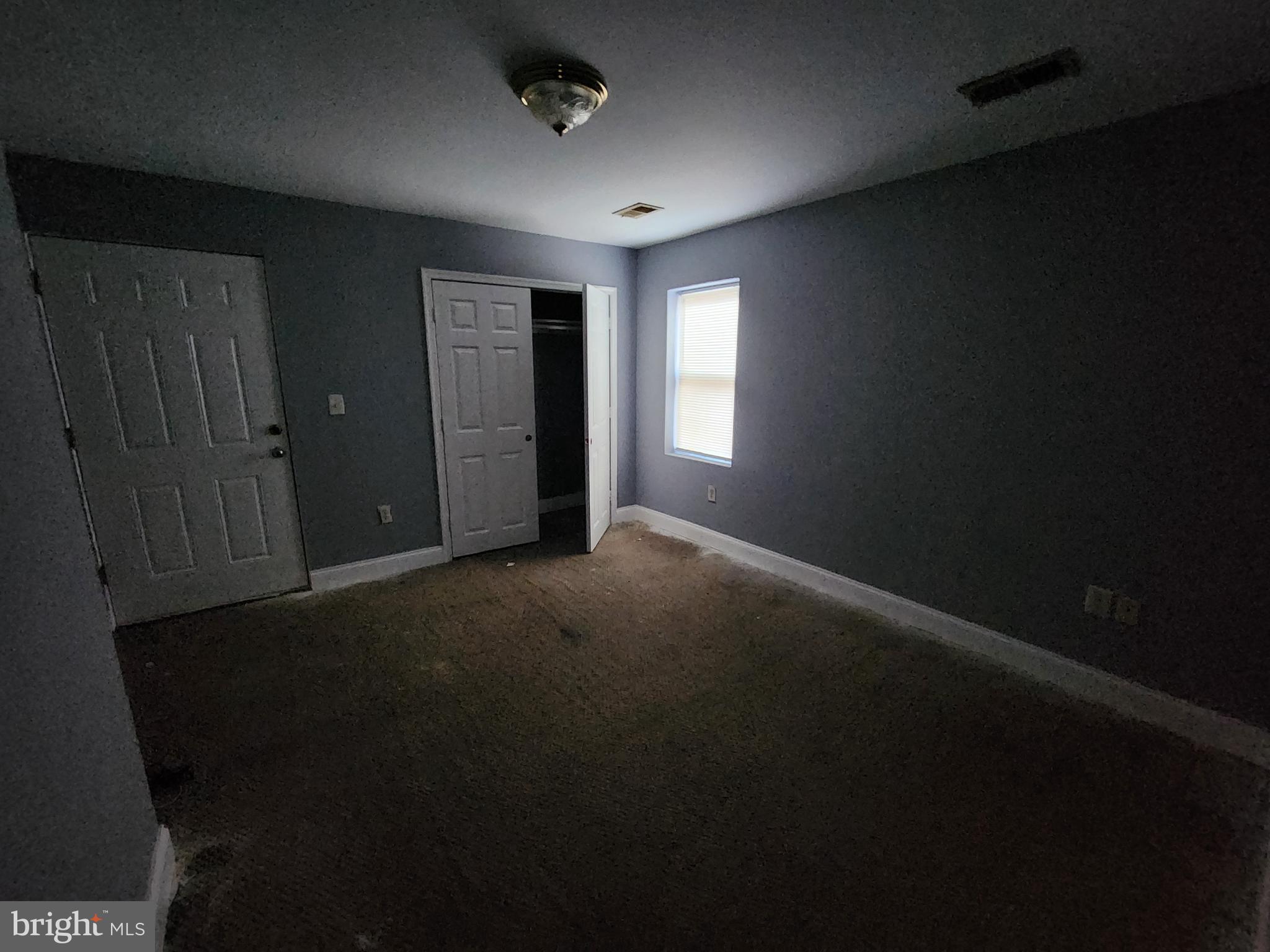 32 South Fulton Avenue Baltimore, MD 21223 - Photo 12 of 29 a view of an empty room with a window