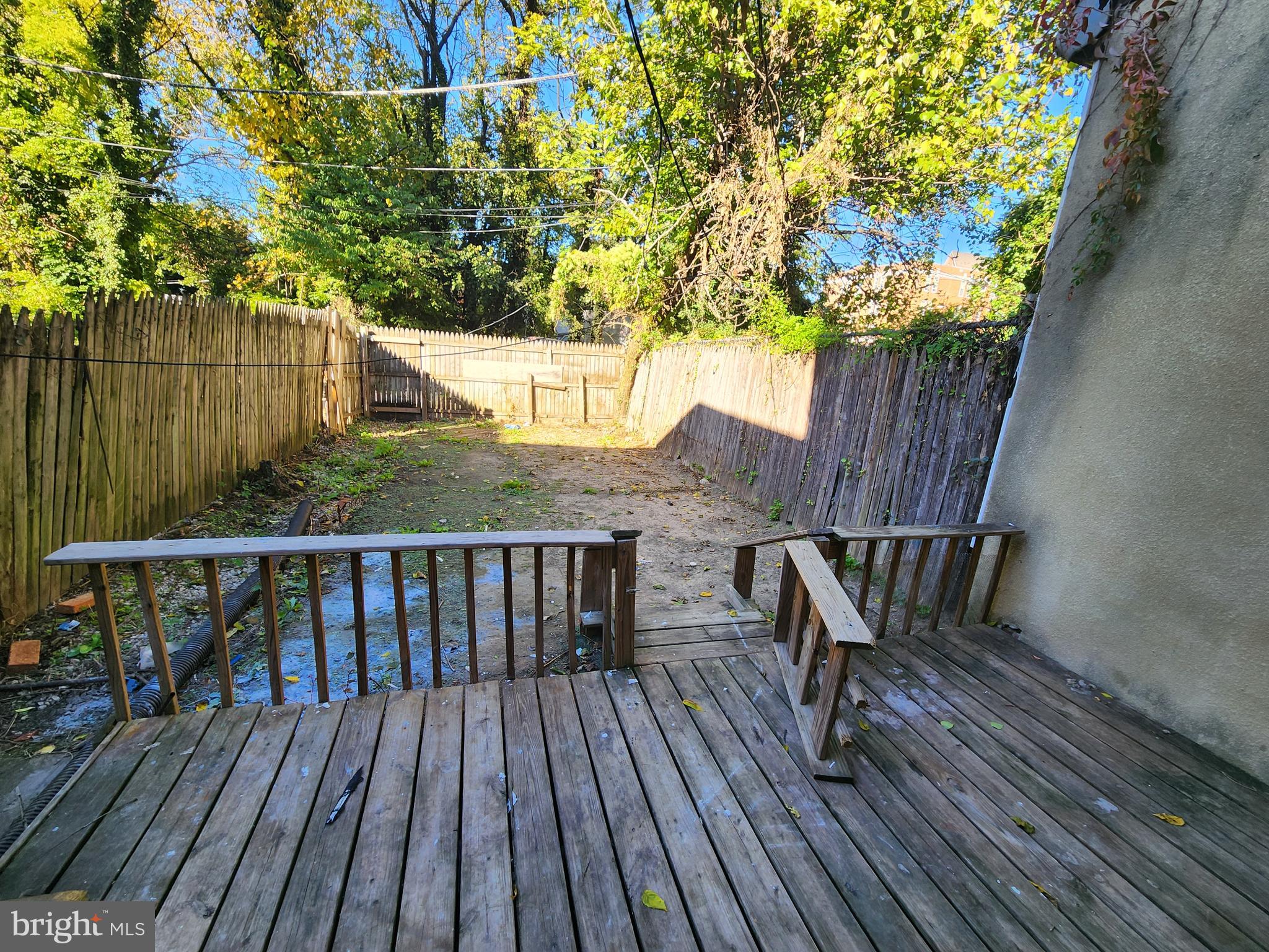 32 South Fulton Avenue Baltimore, MD 21223 - Photo 14 of 29 a view of balcony with wooden floor and outdoor seating