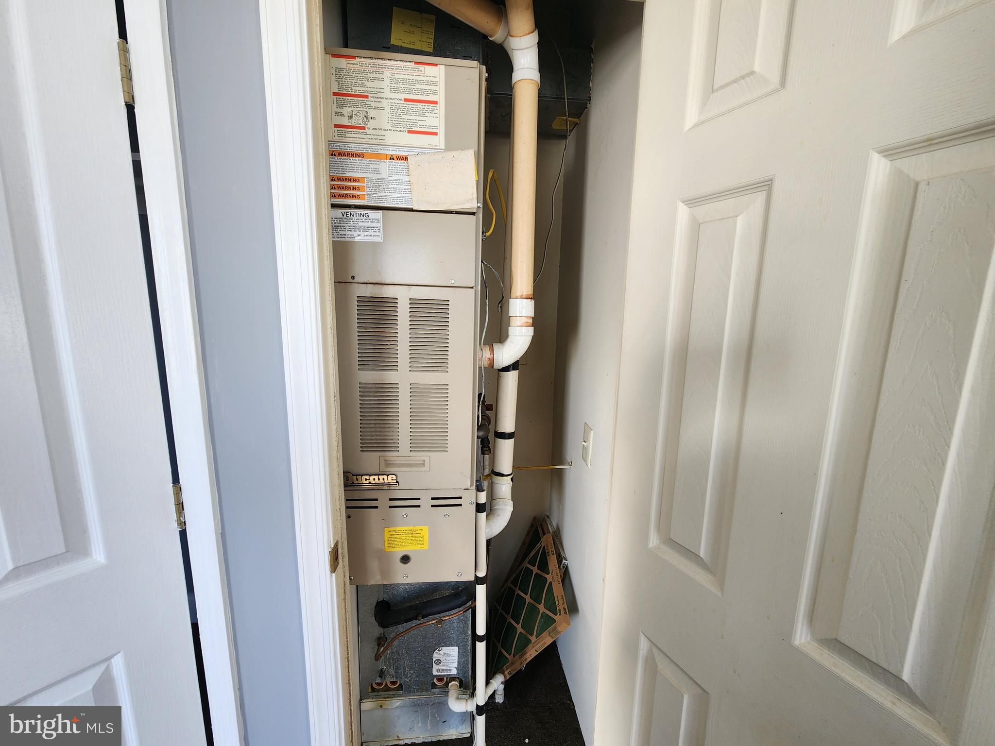 32 South Fulton Avenue Baltimore, MD 21223 - Photo 26 of 29 a view of a hallway with wooden floor and entryway