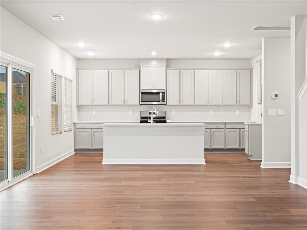 130 Blooming Mdw Road Piedmont, SC 29673 - Photo 4 of 12 Photo is not of the actual home, but is an inspirational photo of builder’s model home and may depict options, furnishings, and/or decorator features that are not included