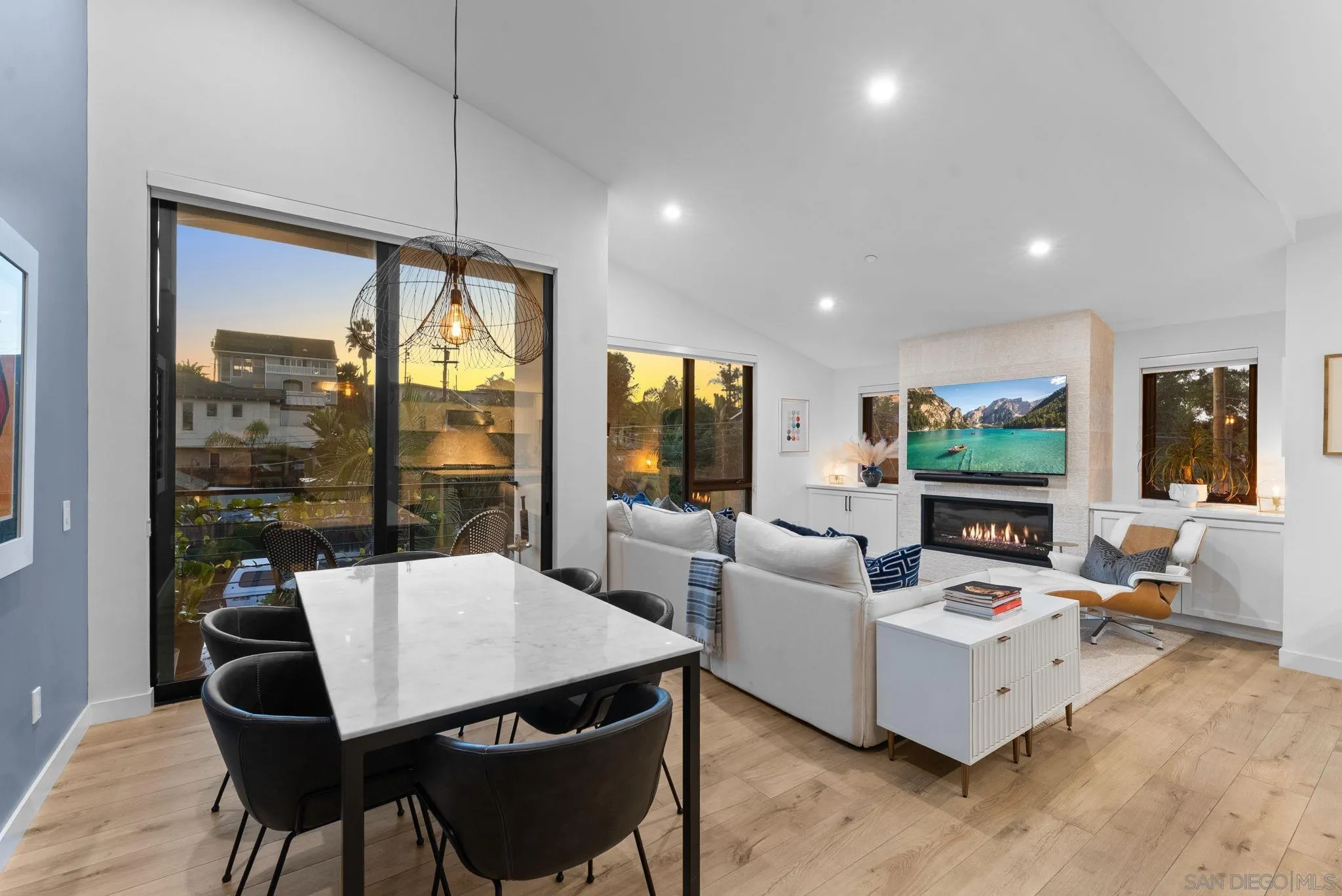 768 North Coast Highway 101 Encinitas, CA 92024 - Photo 11 of 68 a living room with furniture large window and flat screen tv