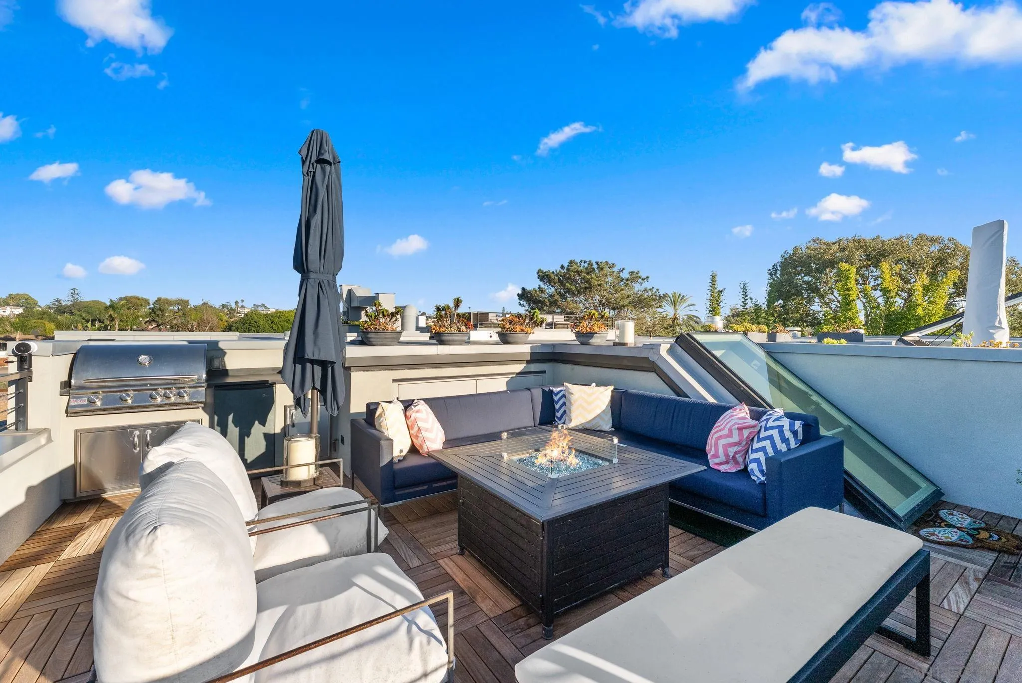 768 North Coast Highway 101 Encinitas, CA 92024 - Photo 3 of 68 a view of a terrace with furniture and a fire pit