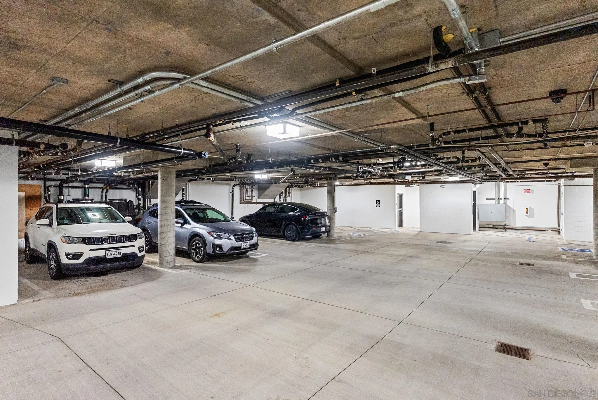 768 North Coast Highway 101 Encinitas, CA 92024 - Photo 49 of 68 a view of parking garage with cars
