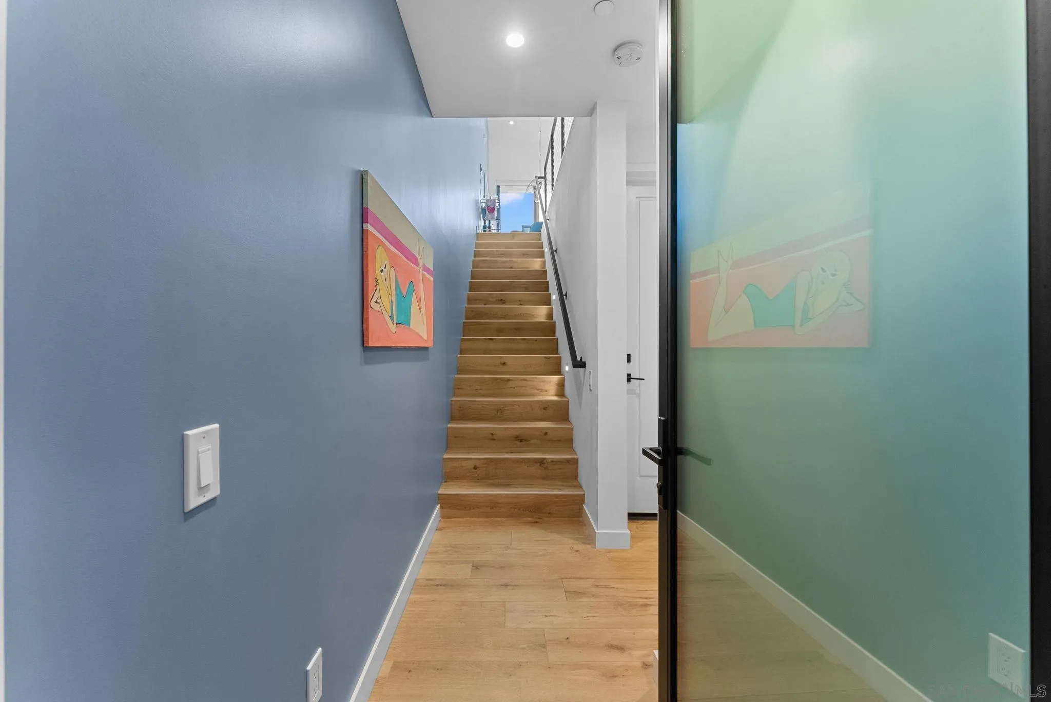 768 North Coast Highway 101 Encinitas, CA 92024 - Photo 8 of 68 a view of entryway and hall with wooden floor