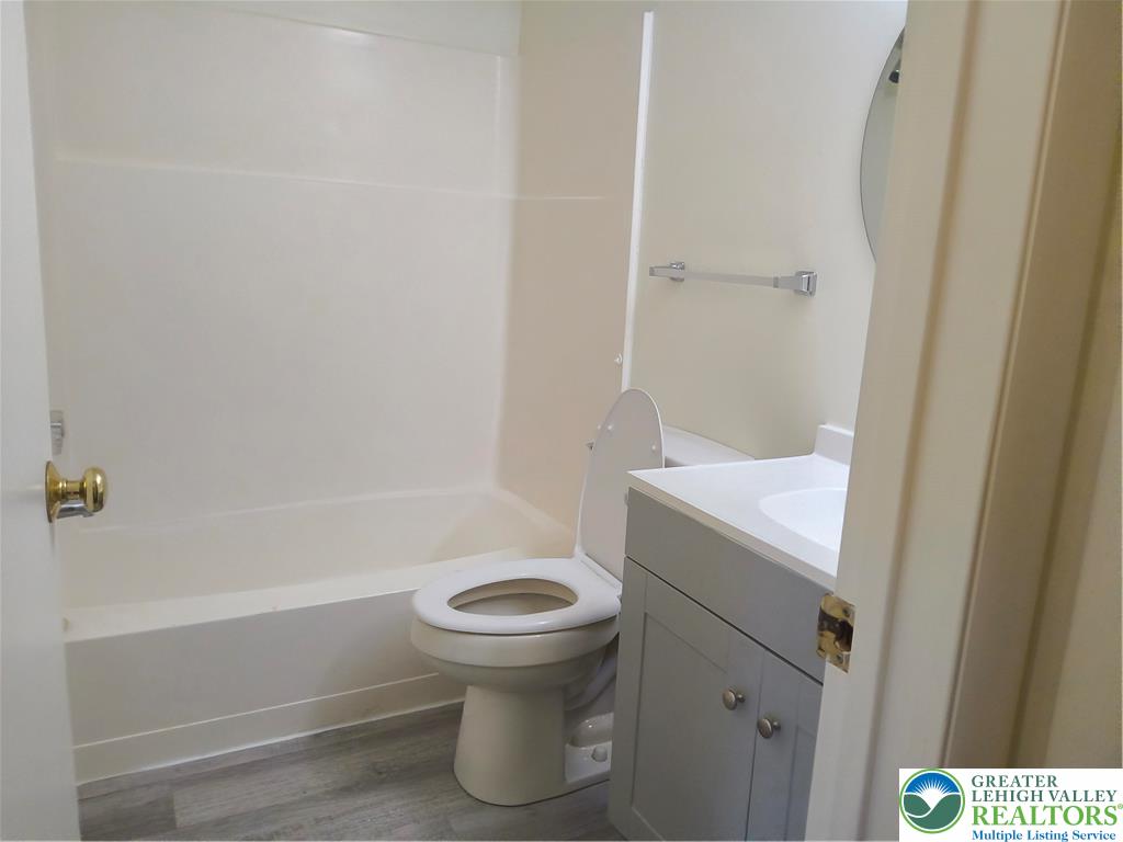 802 West Berwick Street Easton, PA 18042 - Photo 12 of 54 a bathroom with a sink and toilet