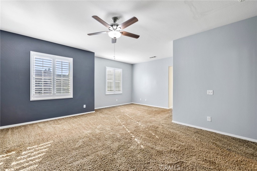 46221 Jane Place Temecula, CA 92592 - Photo 20 of 41 a view of an empty room with a window