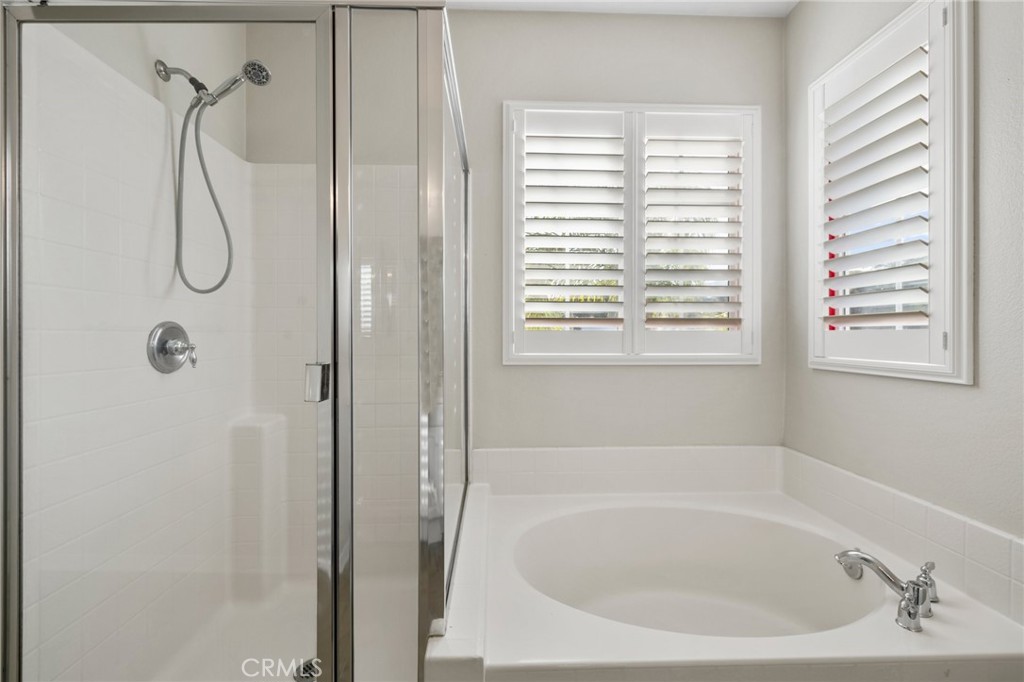 46221 Jane Place Temecula, CA 92592 - Photo 25 of 41 a white bath tub with a shower