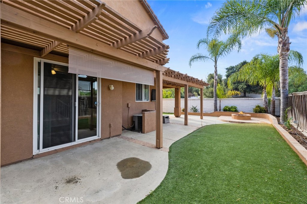 46221 Jane Place Temecula, CA 92592 - Photo 33 of 41 a view of a backyard with a patio