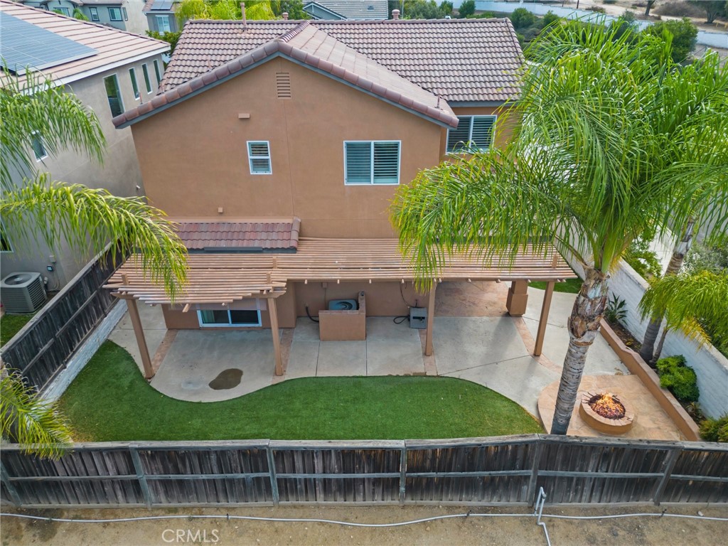 46221 Jane Place Temecula, CA 92592 - Photo 39 of 41 a view of house with backyard and outdoor seating
