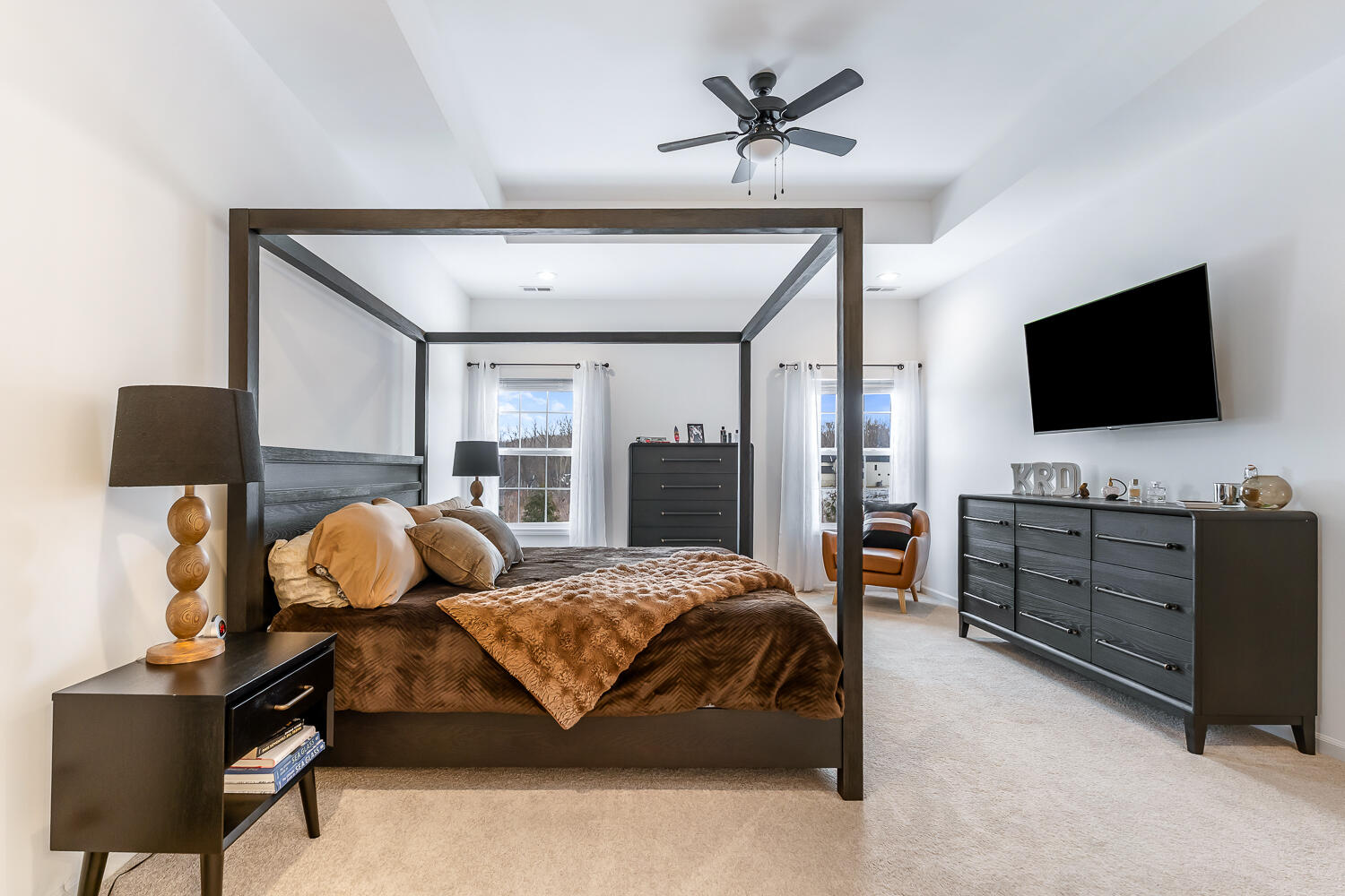 709 Verdano Terrace Crown Point, IN 46307 - Photo 26 of 39 a bedroom with a bed and wooden floor