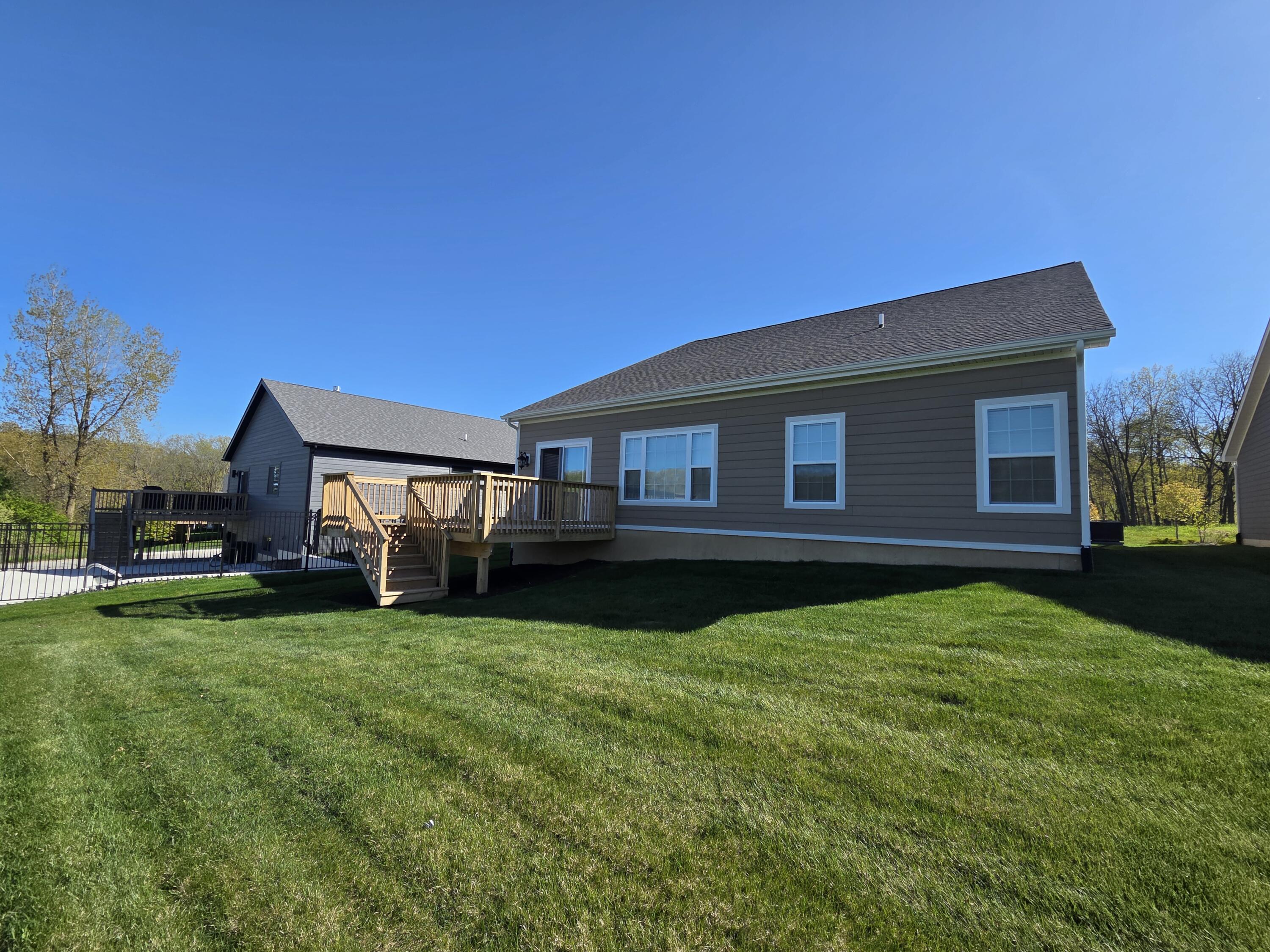 709 Verdano Terrace Crown Point, IN 46307 - Photo 38 of 39 a view of a house with a yard and sitting area