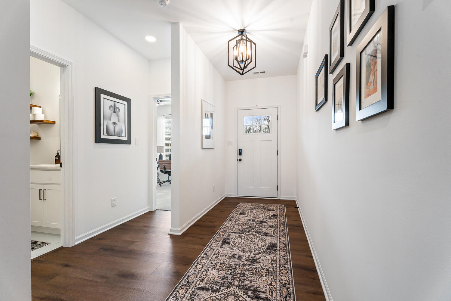 709 Verdano Terrace Crown Point, IN 46307 - Photo 5 of 39 a view of hallway with wooden floor