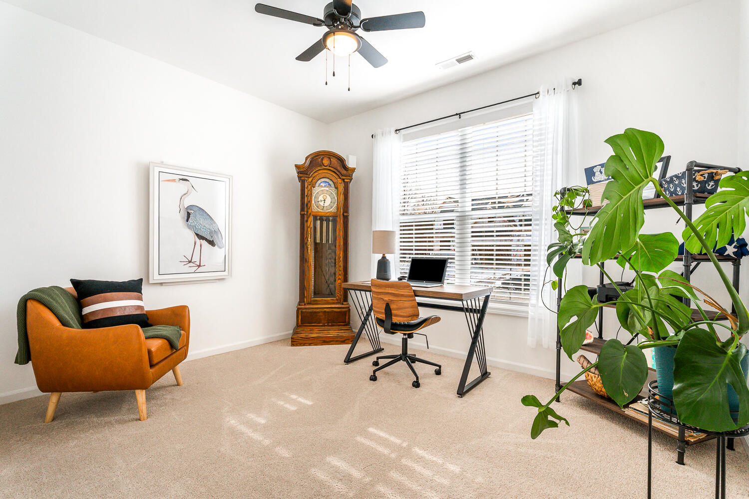 709 Verdano Terrace Crown Point, IN 46307 - Photo 8 of 39 a living room with furniture and a potted plant