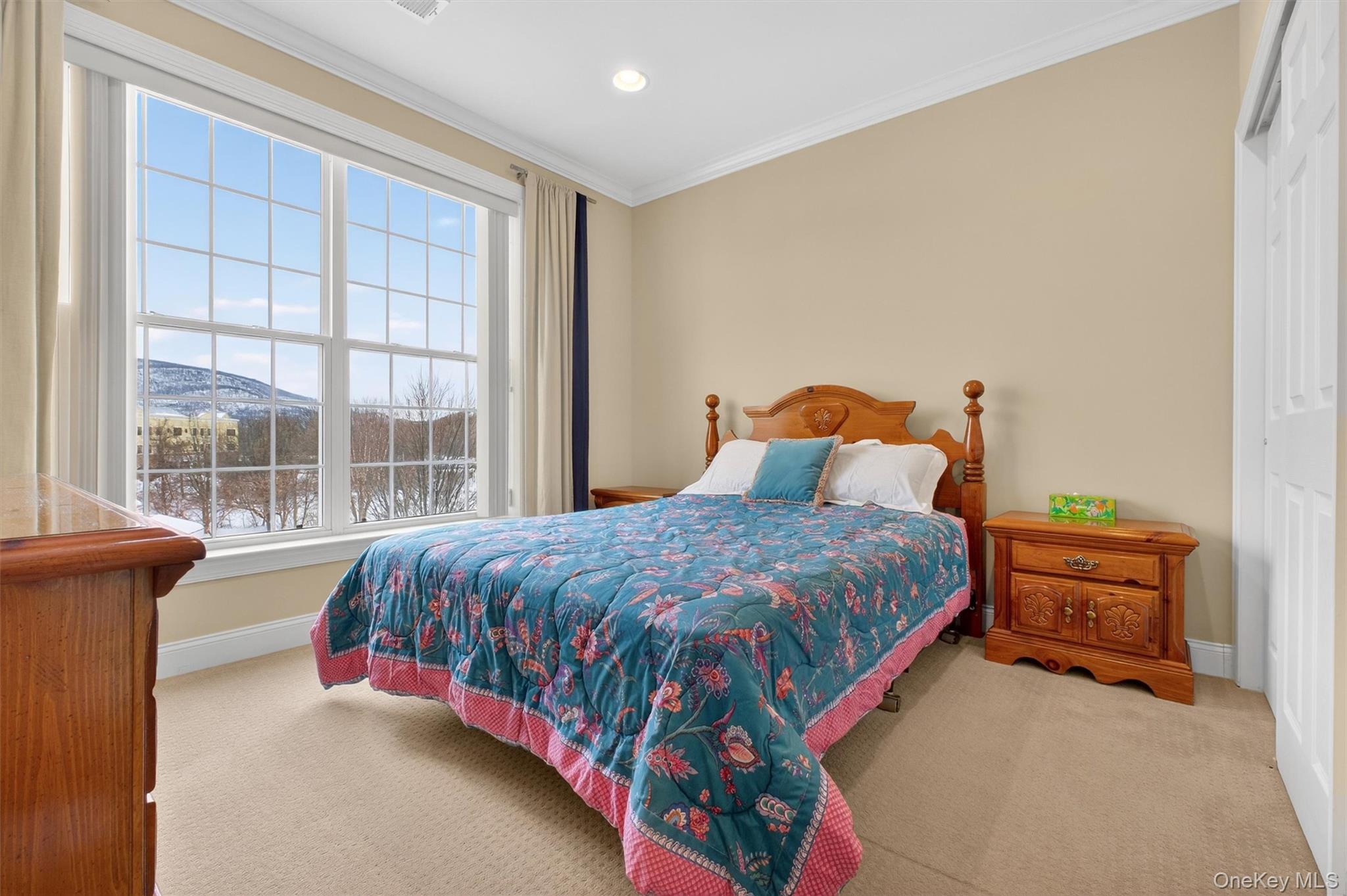 734 Regency Drive Fishkill, NY 12524 - Photo 21 of 45 a bedroom with a bed and a window