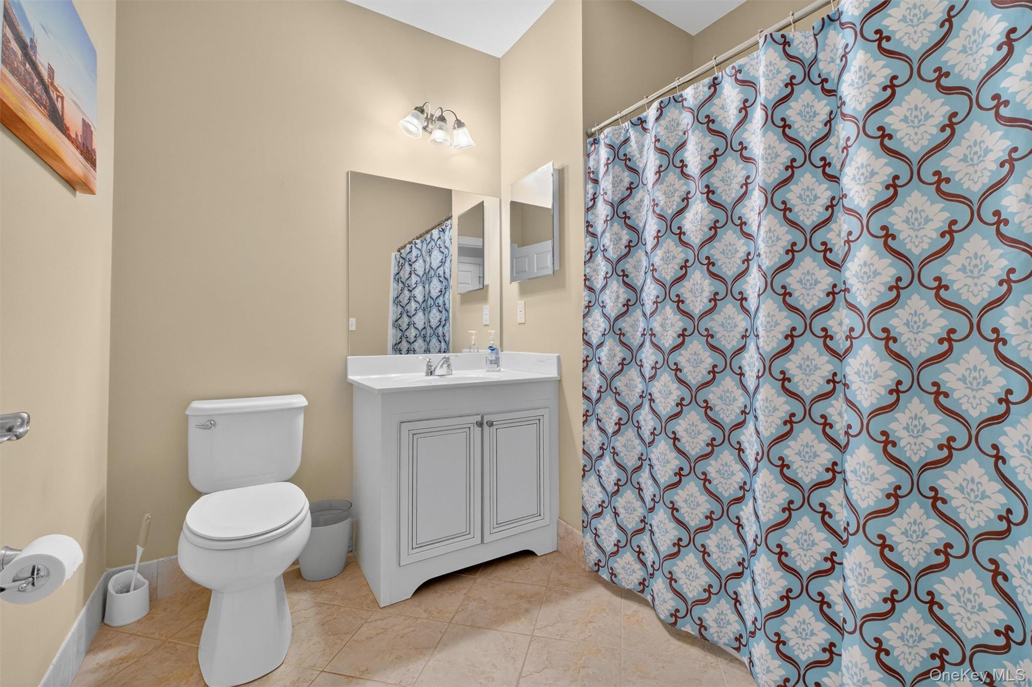 734 Regency Drive Fishkill, NY 12524 - Photo 22 of 45 a bathroom with a toilet and a sink