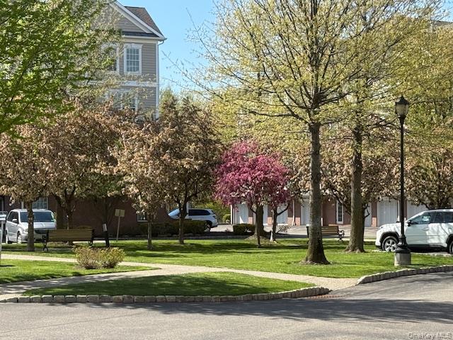 734 Regency Drive Fishkill, NY 12524 - Photo 43 of 45 a brick house with trees in front of it